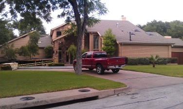 Truck in a Driveway of a Home